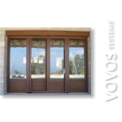 Συνθετικα  κουφωματα  kommerling με ρολα εξωτερικα, πορτα  με ρολο σε πετρινο σπιτι στον  Πυργο Κορινθιας