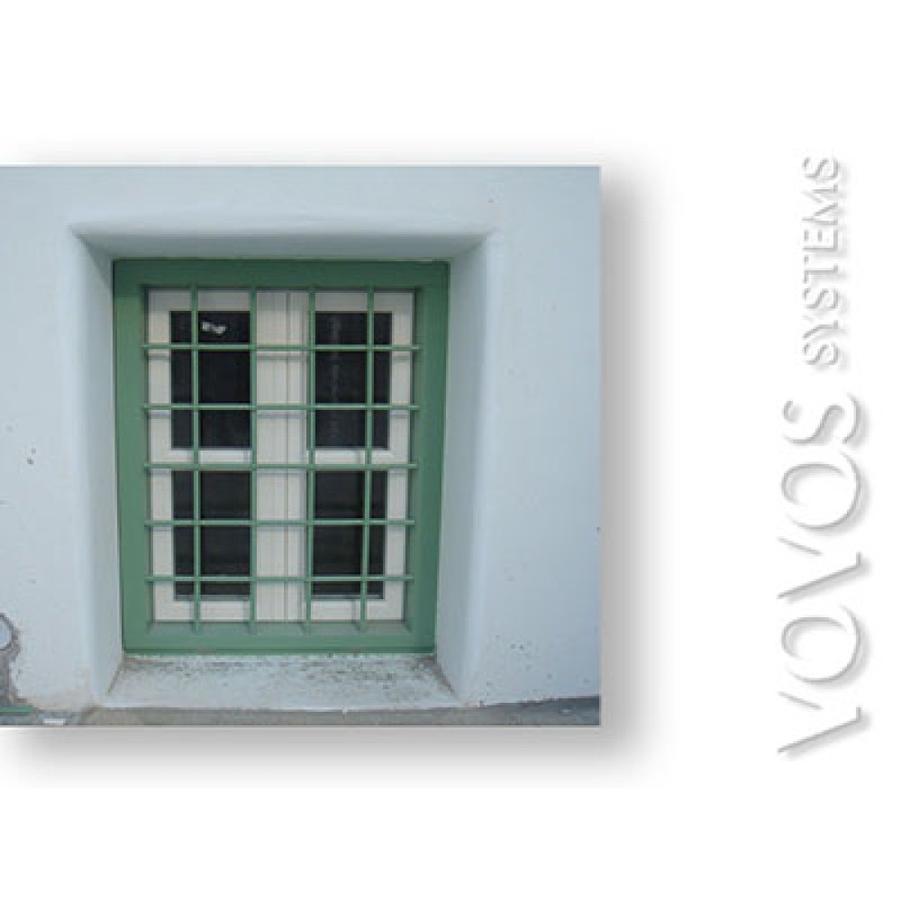 Ξυλινα κουφωματα , Παραθυρα  με καιτια και σιδερια ασφαλειας  σε ενοικιαζομενα  στην Νιό - Ιος