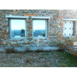 Συνθετικα Κουφωματα , PVC παραθυρα  πορτες  ενεργειακα kommerling  σε πετρινο σπιτι στην ΤΖΙΑ