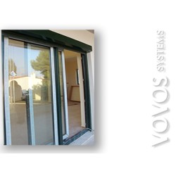 Μοντερνα Συνθετικα pvc κουφωματα Kommerling , συρομενα  επαλληλα με εξωτερικα ηλεκτρικα  ρολα στην Παλληνη Αττικης